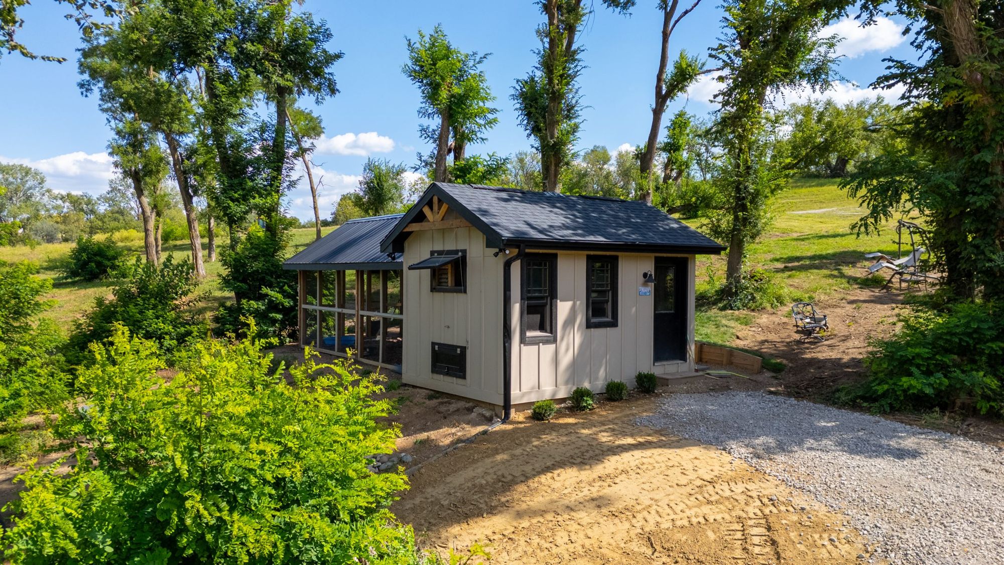 Chicken coop among the trees