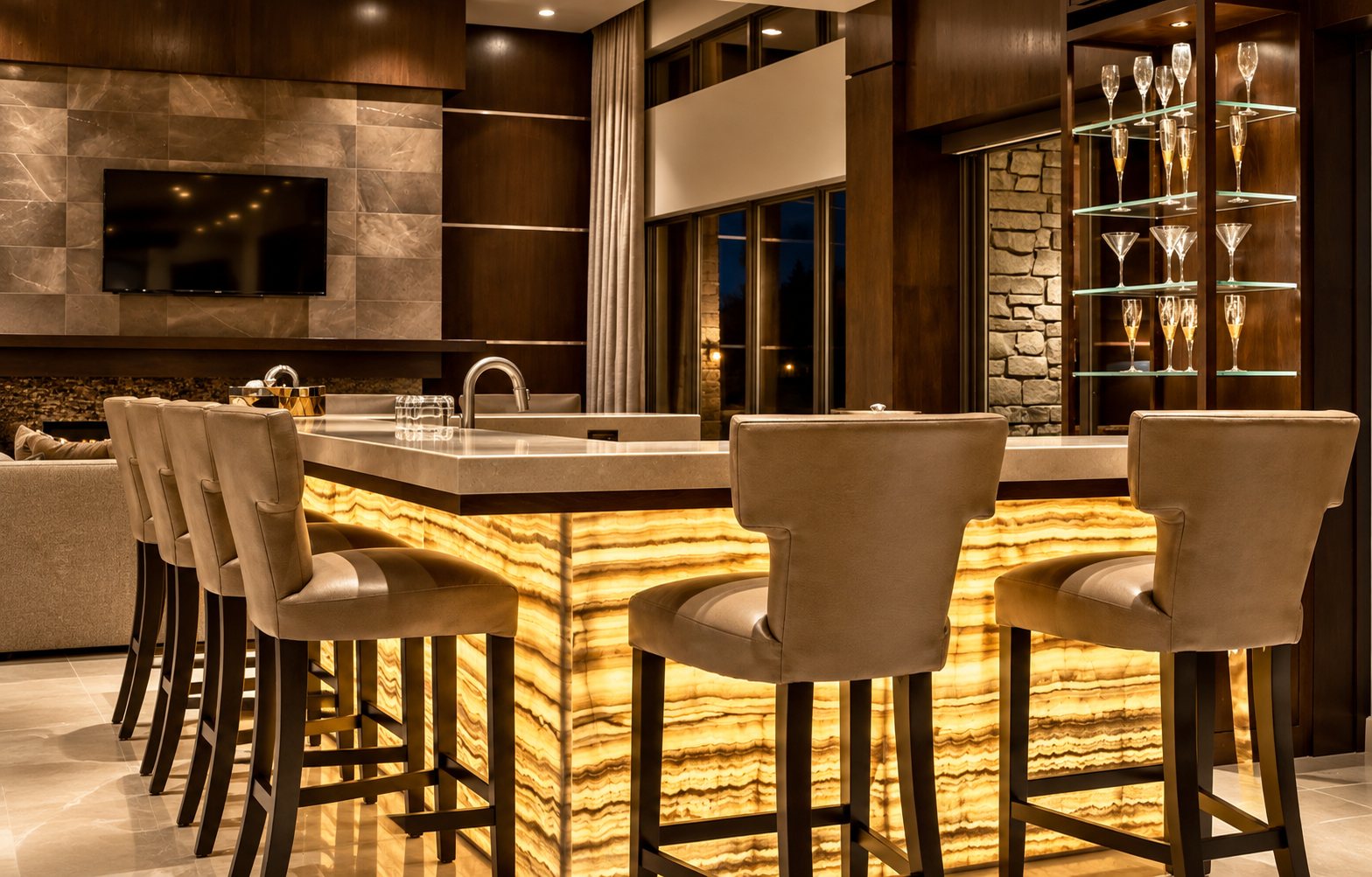 Backlit onyx bar with upholstered stools